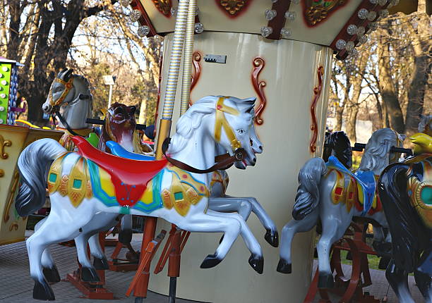 istock Old carousel in a winter holiday park 532505633