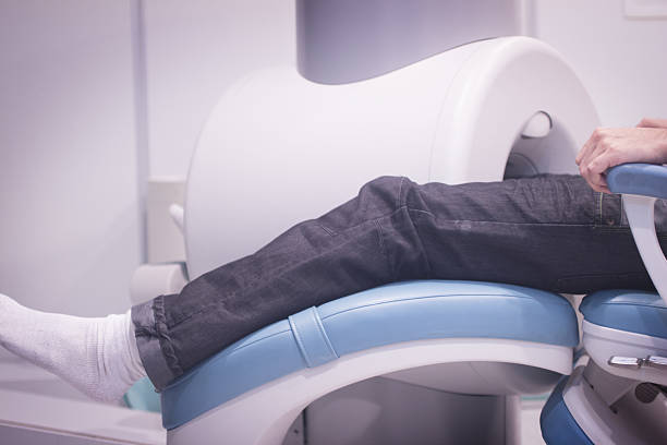 istock Patient and Doctor in fully open MRI CAT Scan 532516367