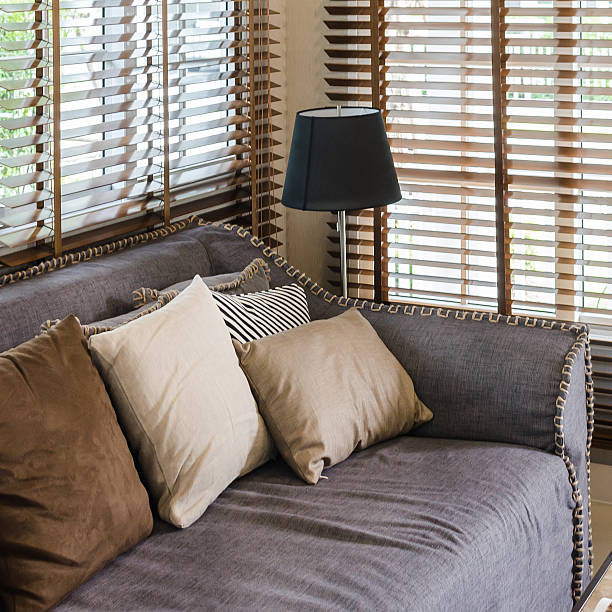 istock living room design with pillows on sofa and bamboo blind 532516419