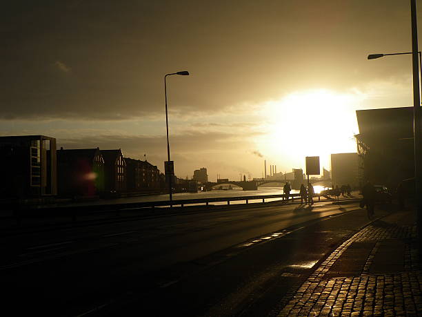 istock Dramatic sunset along an industrial city river 532517725