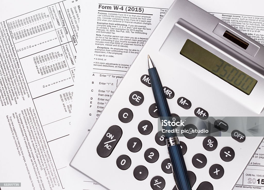 Tax W-4 Preparation  Tax Form 4 W Calculator Stock Photo