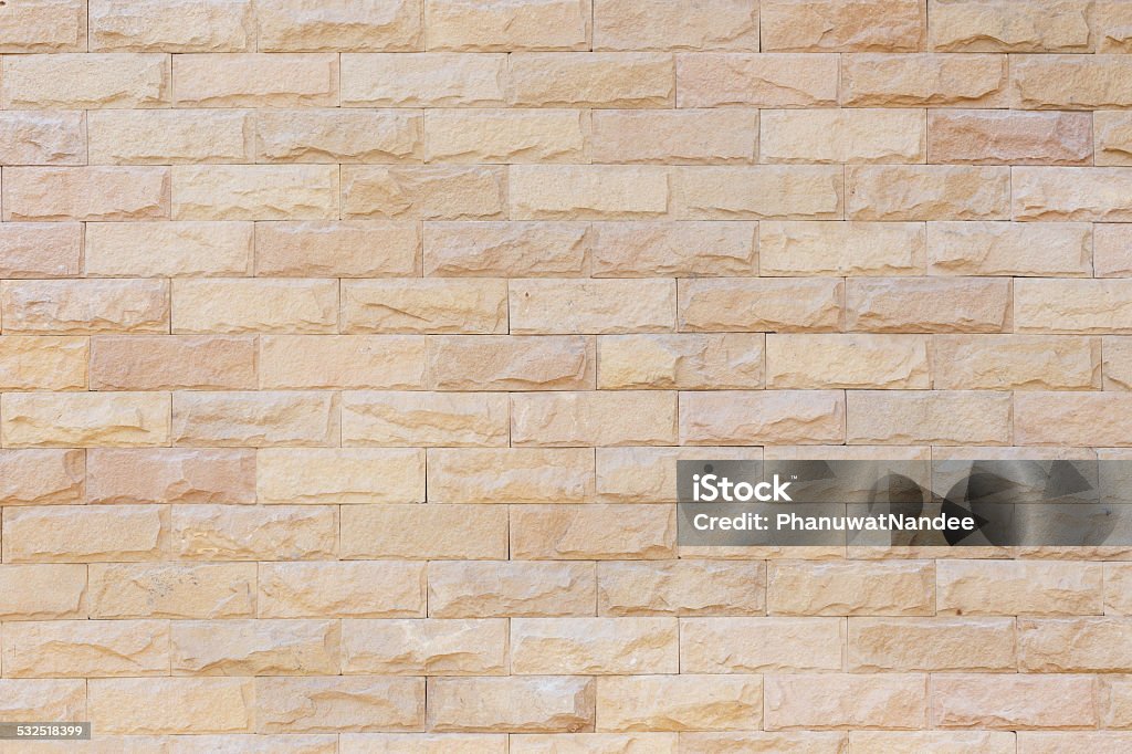 Sandstone wall texture for background Sandstone Stock Photo