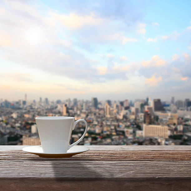 istock Cup of coffee on wooden table 532519087