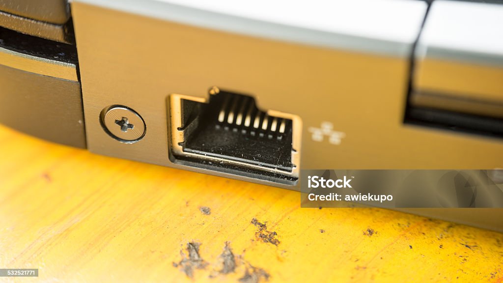 Computer laptop selective focus on network or LAN port Show sideview closeup up of computer laptop selective focus on network or LAN port 2015 Stock Photo