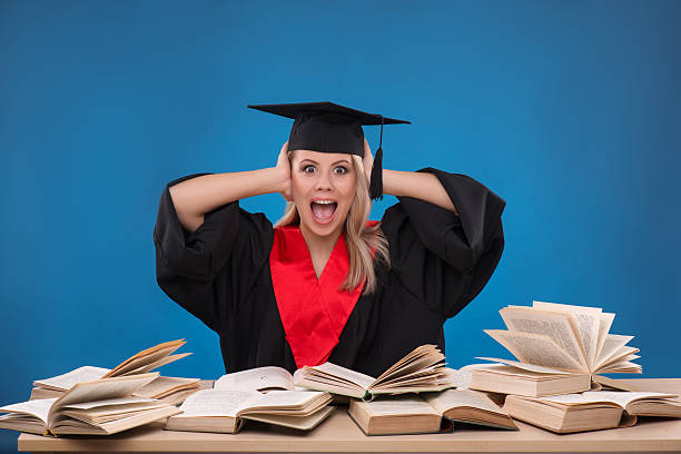 istock Student girl on blue background 532523337