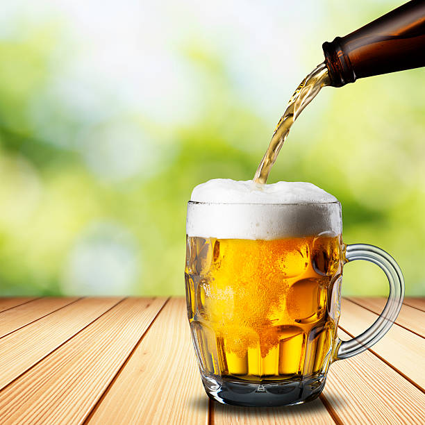 istock Beer Pour from Bottle to Glass 532534861