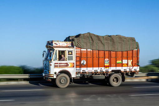 Jewar Banger, India - November 12, 2011: truck uses the YAmuna express way in Jewar Banger, India. The Highway is a toll road and was finally inaugurated at August 2012.