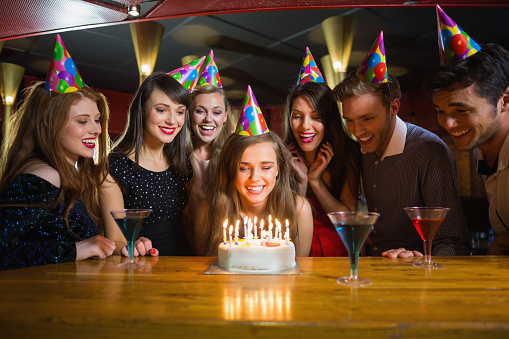 Friends celebrating a birthday together at the nightclub