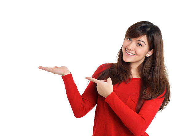 istock Smiling woman pointing product 532546951