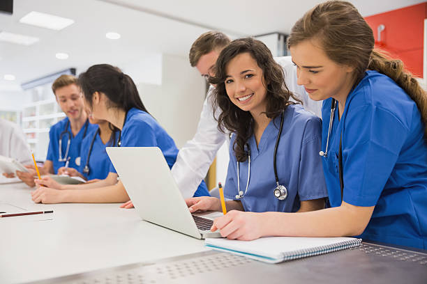 istock Medical student smiling at the camera during class 532548537