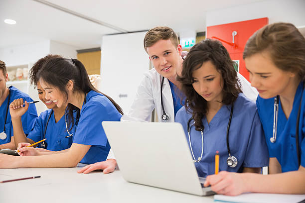 istock Medical student smiling at the camera during class 532548543