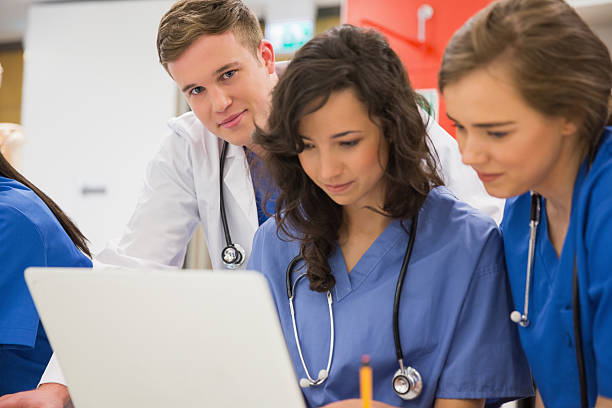 istock Medical student smiling at the camera during class 532548545
