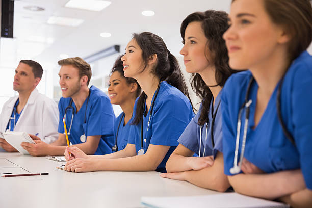istock Medical students listening sitting at desk 532548561