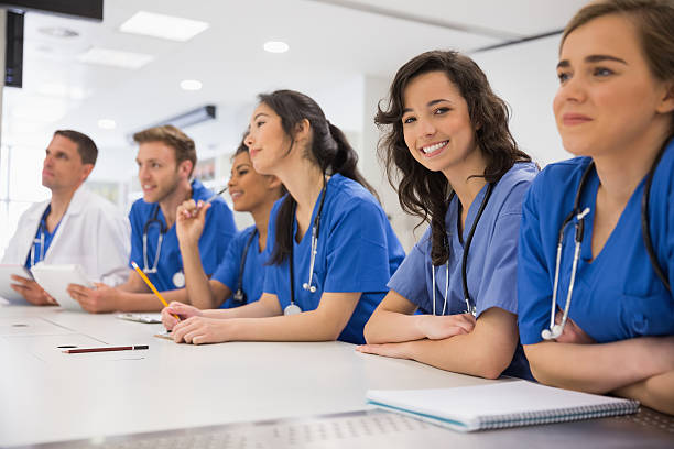 istock Medical student smiling at the camera during class 532548563