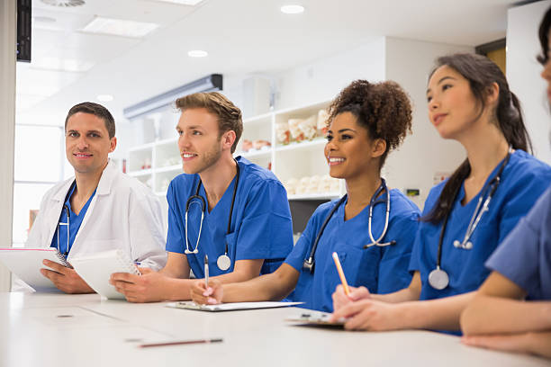 istock Medical student smiling at the camera during class 532548601