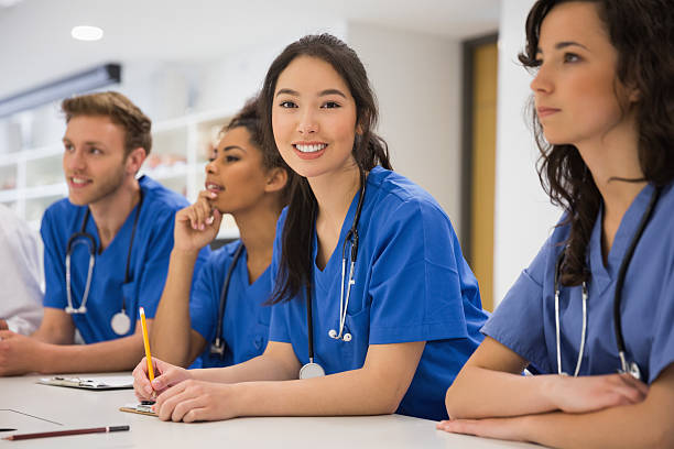 istock Medical student smiling at the camera during class 532548677