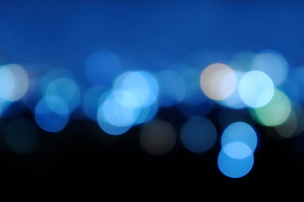 image of blur bokeh light in city in blue tone