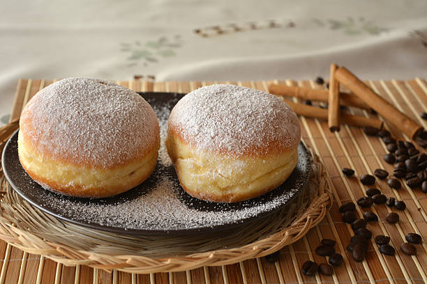 istock Donuts with powdered sugar on the brown plate 532549913