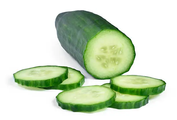 Fresh cucumber, isolated on white. Chopped cucumber.