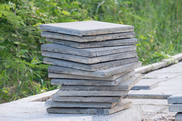 istock Concrete stones for the sidewalk pavement, concrete bricks. Sele 532551687