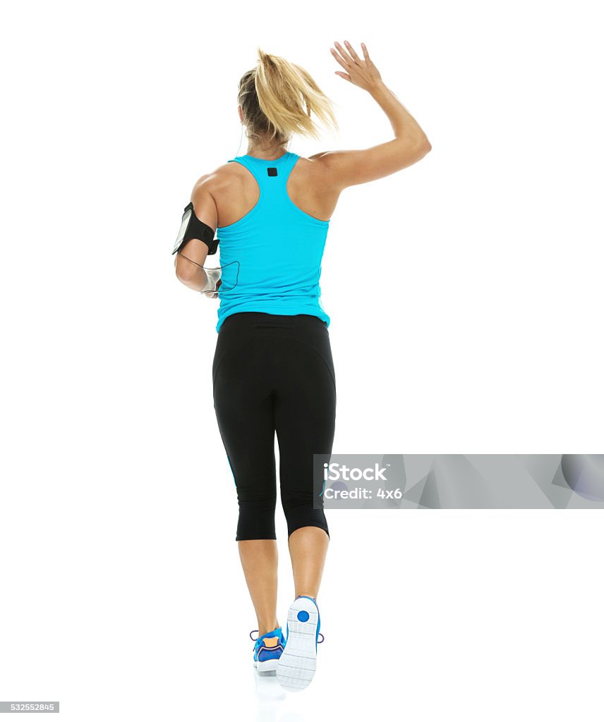 Female runner waving hand Female runner waving handhttp://www.twodozendesign.info/i/1.png 20-24 Years Stock Photo