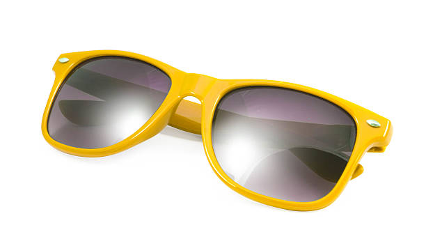 istock Yellow sunglasses on white background 532553506