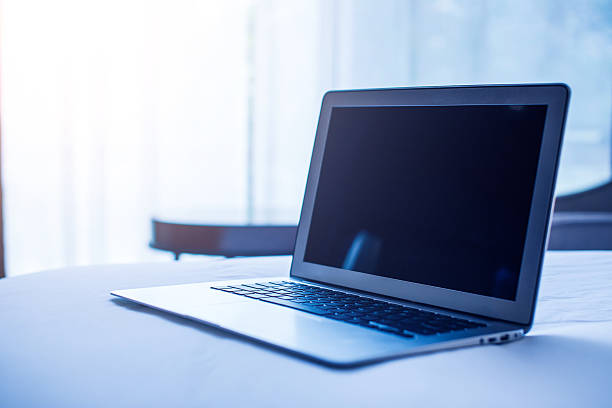 istock Laptop on Bed in Modern Bedroom 532556776