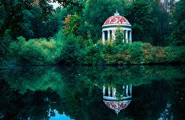 istock Gazebo Rotunda in the park by small pond 532557868