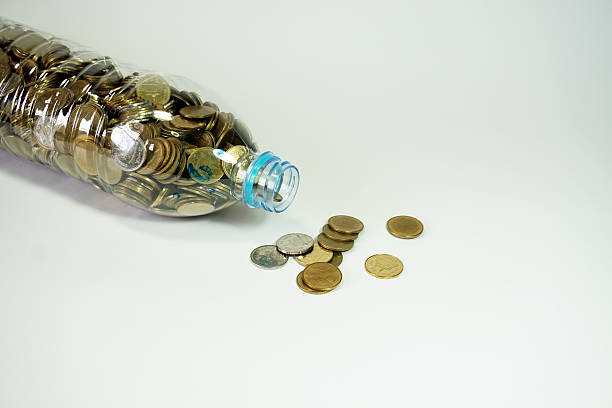 istock Saving Thai baht  coins in recycle bottle 532557912