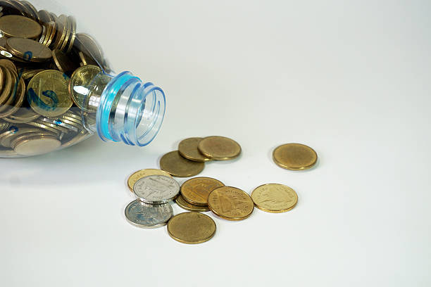 istock Saving Thai coins in recycle plastic  bottle 532558248