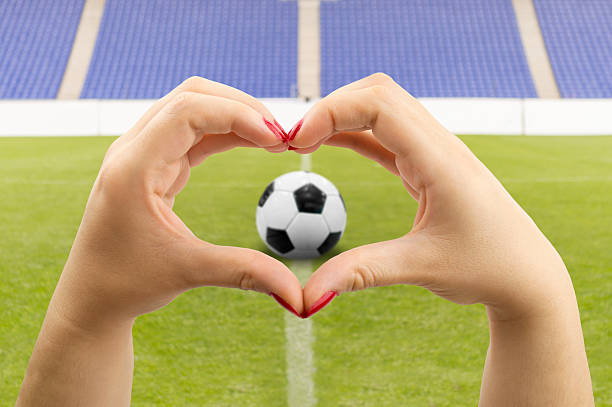 istock she loves football 532559250