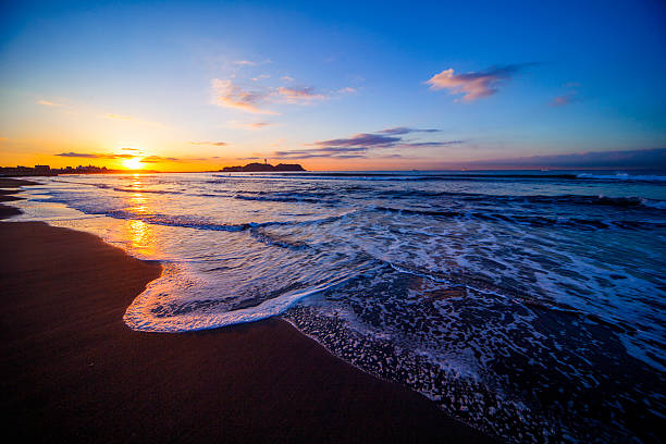 istock Beautiful sunrise on the beach with Enoshima 532559298