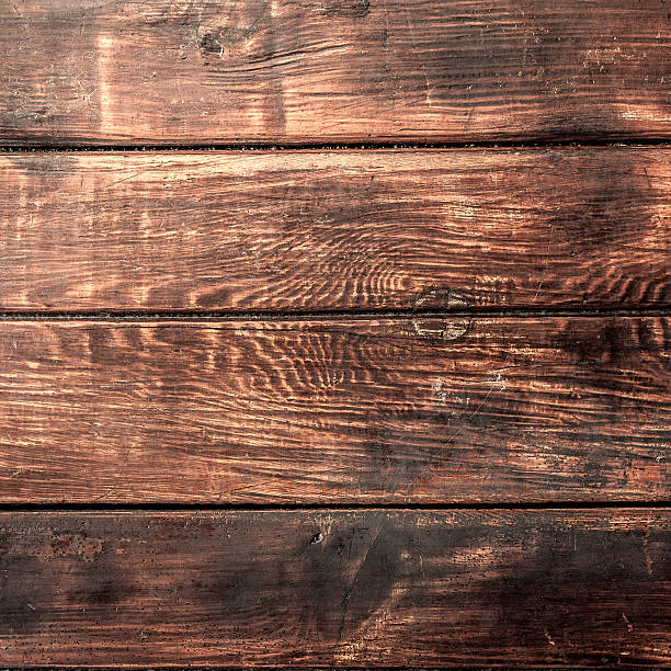 istock weathered barn wood background with knots 532561846
