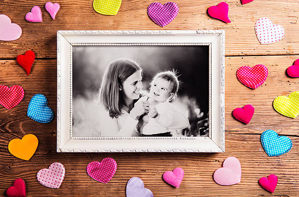 istock Mothers day composition, picture frame. Studio shot, wooden, bac 532566198