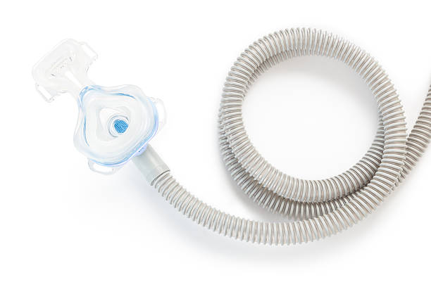istock CPAP mask and hose on white background 532568328