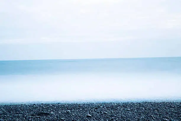 Seawater in a black beach in Iceland. Landscape beach.