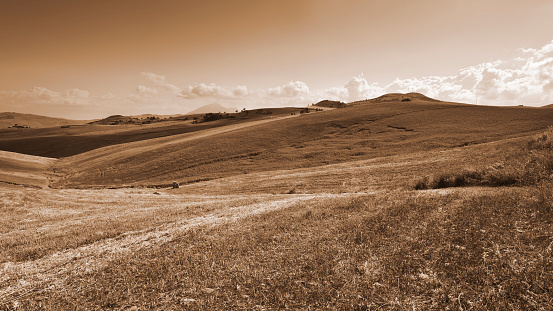 Stubble Fields on the Hills of Sicily at Sunset, Vintage Style Sepia