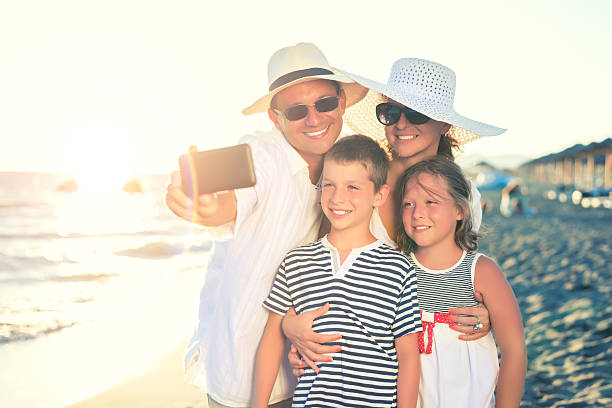 istock Smiling Family taking a selfie 532572092