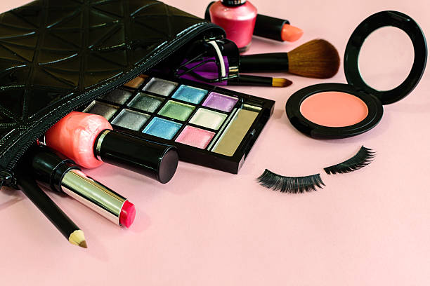 istock make up with cosmetics and brushes isolated on pink background 532574490