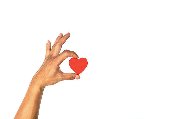 istock Hand with heart isolated on white background 532574491
