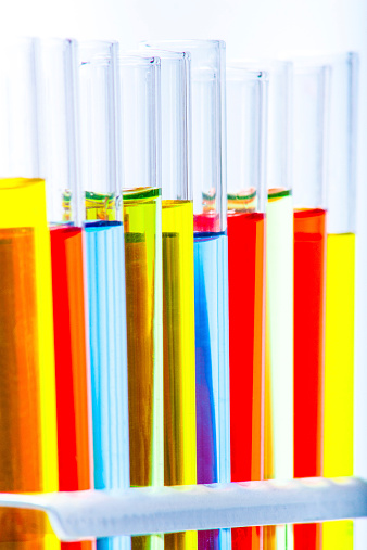 Set of test lab tubes with color liquid on stand