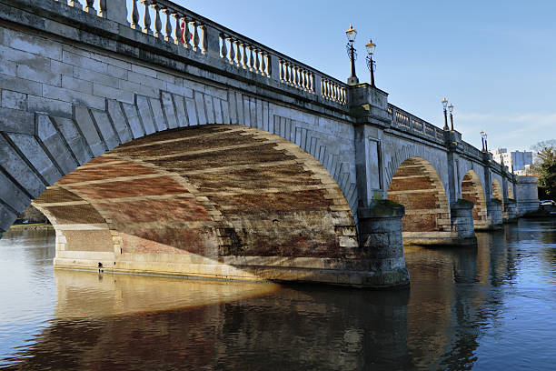 Five-span bridge across the River Thames at Kingston stock photo