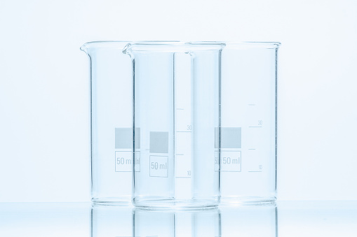Set of three empty temperature resistant cylindrical beakers for measurements
