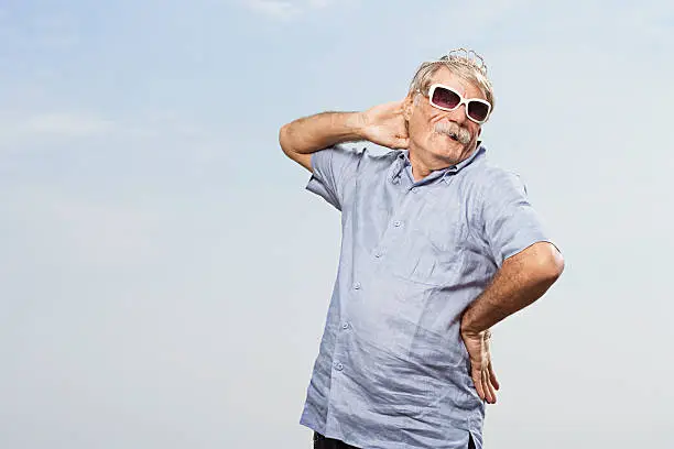 Photo of Man wearing a tiara and sunglasses