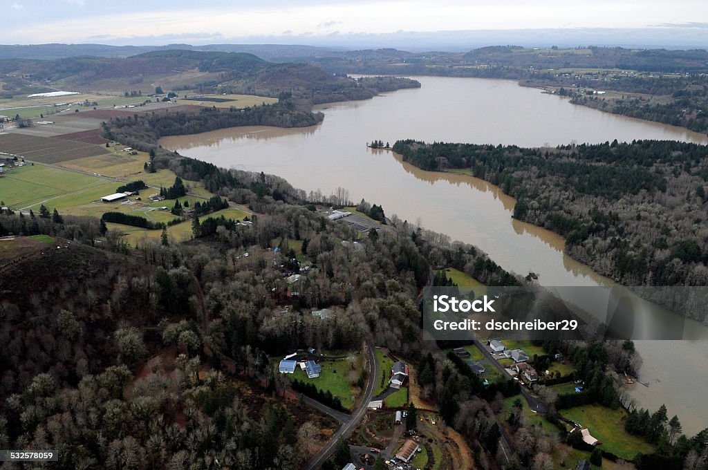 Cowlitz River flooding, Washington state Water swells from the banks of the Cowlitz River in Washington state. 2015 Stock Photo