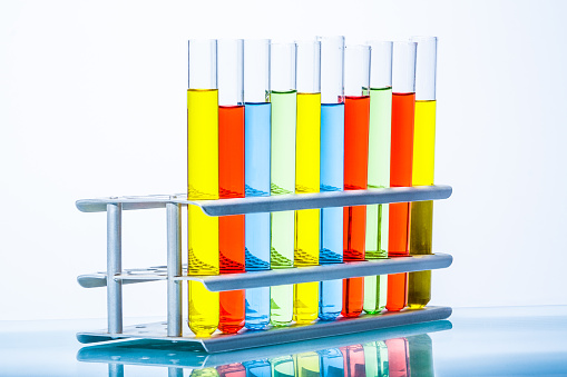 Set of test lab tubes with color liquid on stand