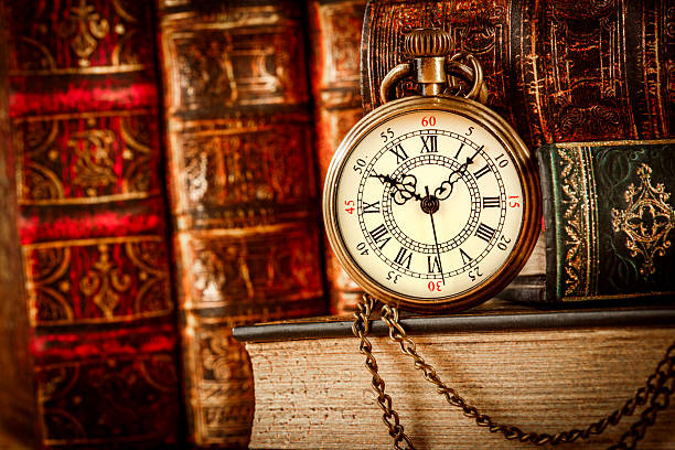 istock Old Books and Vintage pocket watch 532578818