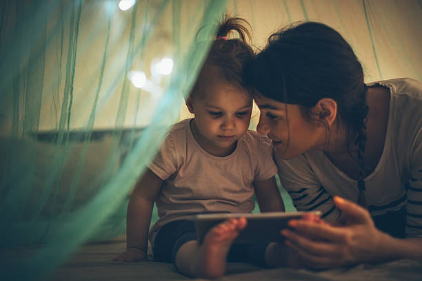 Choosing her favourite bedtime ebook