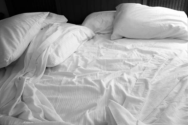istock Unmade,slept in, messy bed with pillows 532579838