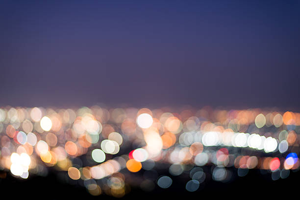 istock cityscape at night with lights blurred into bokeh circles backgr 532580169